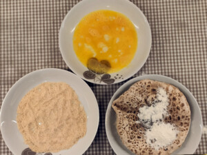 La fase di impanatura.